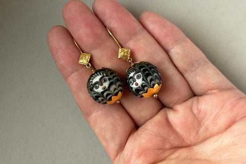 A Pair of Ancient Glass 'Face' Bead Earrings