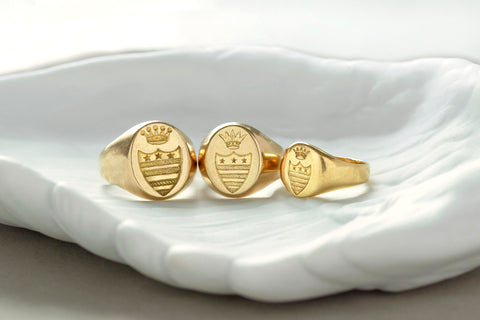 A Set of Three Gold Signet Rings for One Family