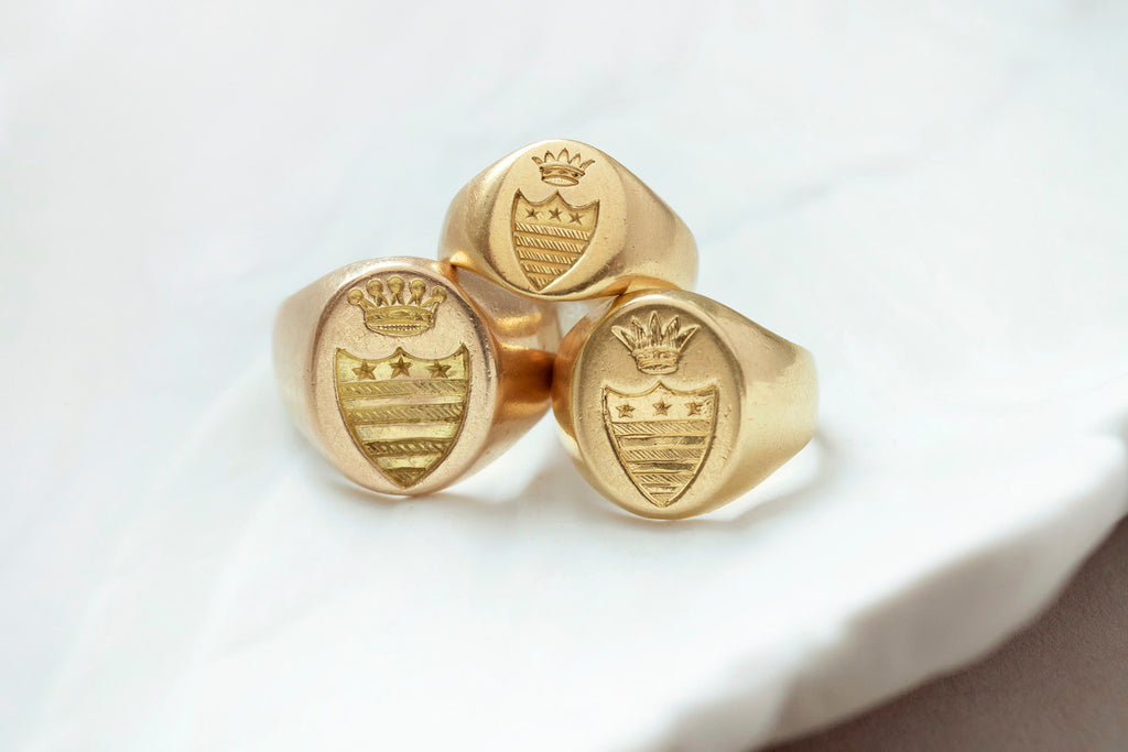 A Set of Three Gold Signet Rings for One Family
