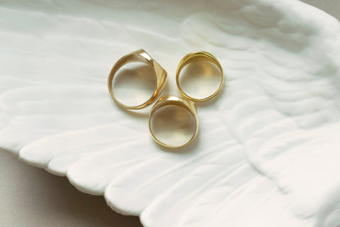 A Set of Three Gold Signet Rings for One Family