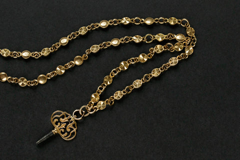 Victorian Ornate Gold Watch Chain with a Key