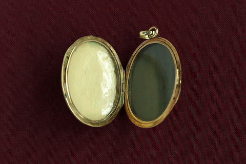 19th Century Enamel Cherub Locket.