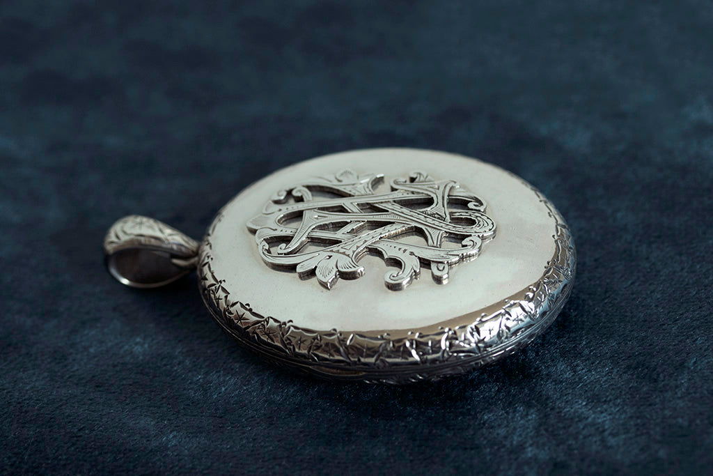 Antique victorian silver locket hot sale