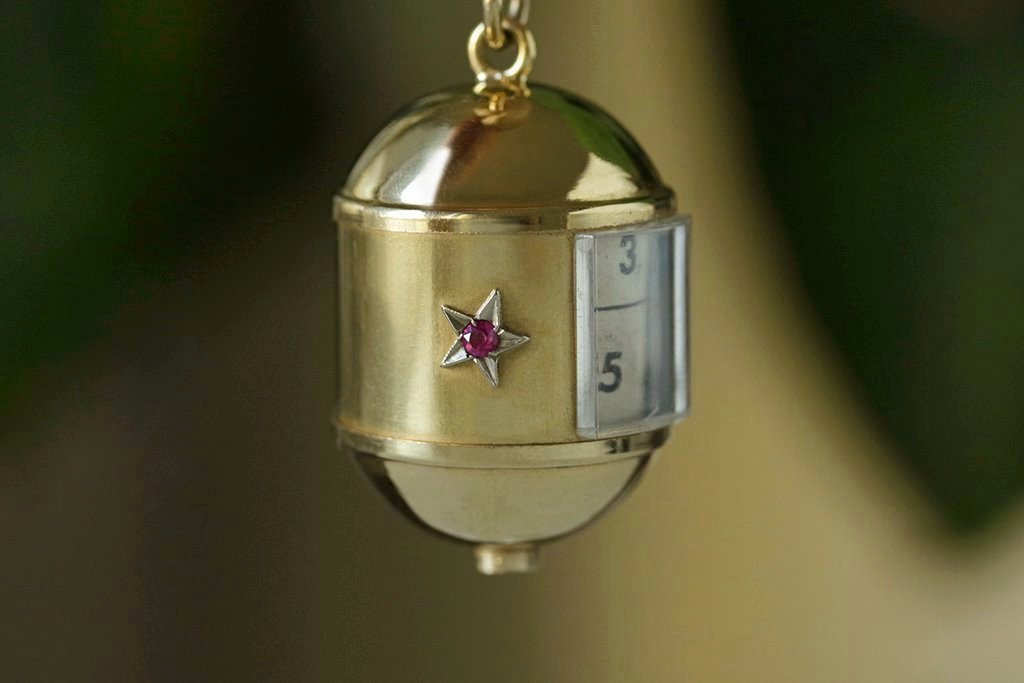1950s Star Egg Pendant with Rolling Locket