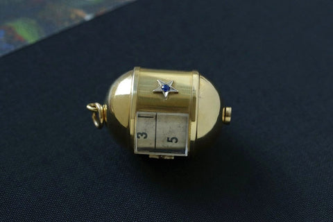 1950s Star Egg Pendant with Rolling Locket